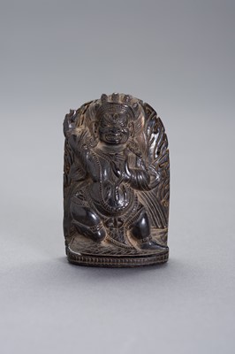 Lot 975 - A SMALL AND FINE BUFFALO HORN STELE OF VAJRAPANI
