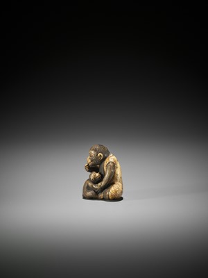 Lot 523 - AN IVORY NETSUKE OF A MONKEY WITH YOUNG