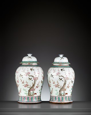 Lot 285 - A PAIR OF LARGE FAMILLE ROSE ‘MAGPIES AND PRUNUS’ BALUSTER VASES AND COVERS, QING DYNASTY