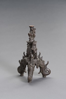 Lot 23 - A FIGURAL CHINESE BRONZE LAMP STAND