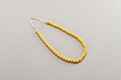 Lot 243 - 46 OLD YELLOW GLASS BEADS