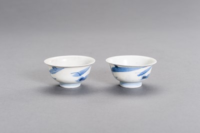 Lot 349 - A PAIR OF FINE BLUE AND WHITE PORCELAIN ‘HATCHER CARGO’ CUPS, TRANSITIONAL