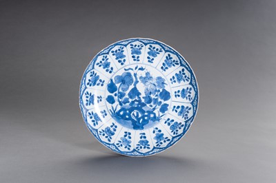 Lot 766 - A BLUE AND WHITE PORCELAIN ‘FLORAL’ DISH, KANGXI