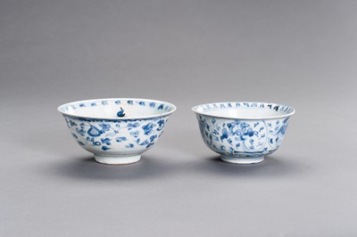 Lot 303 - TWO BLUE AND WHITE PORCELAIN ‘FLORAL’ BOWLS, MING DYNASTY