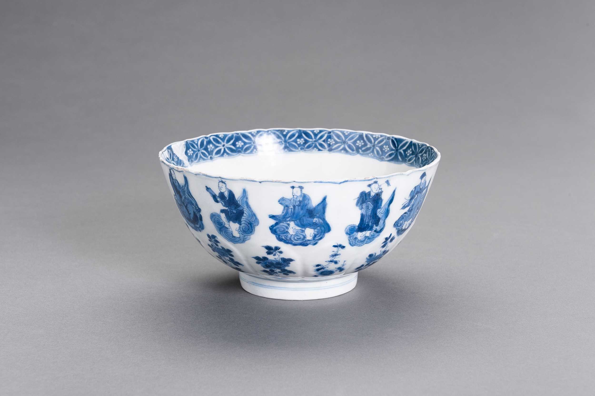 Lot 332 - A BLUE AND WHITE PORCELAIN ‘IMMORTALS’ BOWL, KANGXI