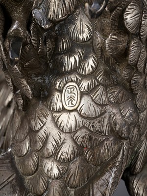 Lot 13 - MASAMITSU: AN IMPRESSIVE SILVERED BRONZE OKIMONO OF AN EAGLE