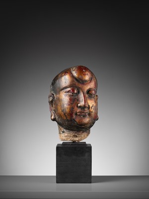 Lot 376 - A GILT AND LACQUERED STUCCO HEAD OF A LUOHAN, YUAN TO MING DYNASTY