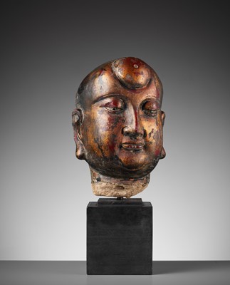 Lot 376 - A GILT AND LACQUERED STUCCO HEAD OF A LUOHAN, YUAN TO MING DYNASTY