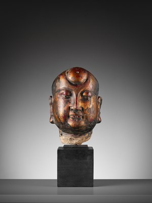 Lot 376 - A GILT AND LACQUERED STUCCO HEAD OF A LUOHAN, YUAN TO MING DYNASTY