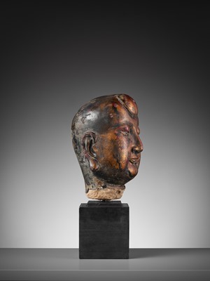 Lot 376 - A GILT AND LACQUERED STUCCO HEAD OF A LUOHAN, YUAN TO MING DYNASTY