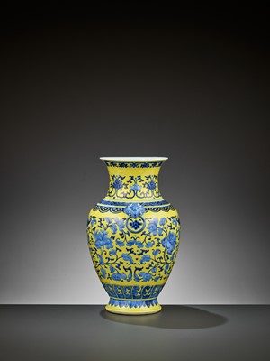Lot 264 - A YELLOW-GROUND BLUE AND WHITE ‘AUSPICIOUS’ HU VASE, QING DYNASTY