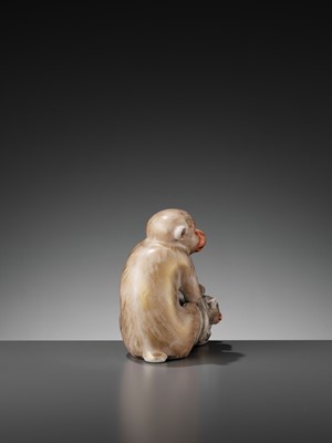 Lot 110 - A PORCELAIN FIGURE OF A MONKEY AND YOUNG