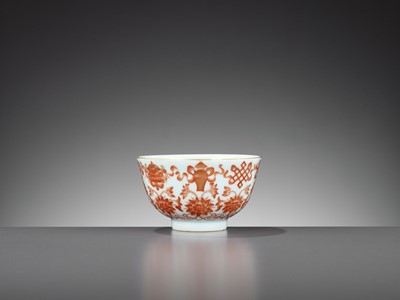 Lot 861 - AN IRON-RED AND GILT-DECORATED ‘BAJIXIANG’ BOWL, DAOGUANG MARK AND PERIOD