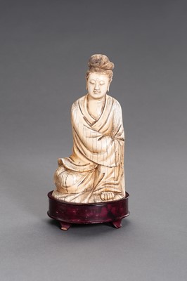 Lot 53 - A MING-STYLE IVORY FIGURE OF GUANYIN, QING DYNASTY