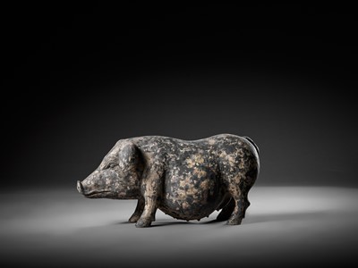Lot 124 - A RARE AND MASSIVE BLACK-PAINTED GRAY POTTERY FIGURE OF A PREGNANT SOW, HAN DYNASTY
