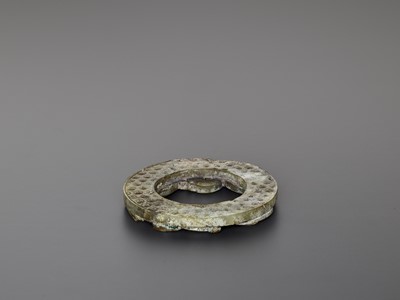Lot 244 - A HAN JADE RING ORNAMENT WITH COILED CHILONG