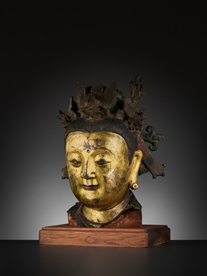 Lot 384 - A HIGHLY IMPORTANT AND VERY LARGE GILT-BRONZE HEAD OF BIXIA YUANJUN, THE PRIMORDIAL SOVEREIGN OF THE COLORED CLOUDS OF DAWN, MING DYNASTY