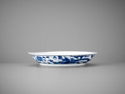 Lot 215 - A BLUE AND WHITE ‘DOUBLE VAJRA’ DISH, KANGXI MARK AND PERIOD