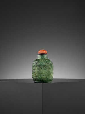 Lot 295 - A SPINACH-GREEN ‘ARCHAISTIC’ JADE SNUFF BOTTLE, QING DYNASTY
