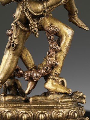 Lot 415 - A GILT COPPER ALLOY FIGURE OF HEVAJRA AND NAIRATMYA, 17TH-18TH CENTURY