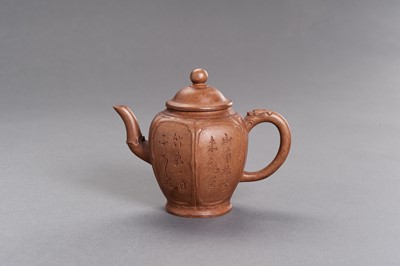 Lot 435 - A YIXING CERAMIC TEAPOT AND COVER