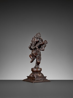 Lot 608 - A SILVER-INLAID BRONZE FIGURE OF GANESHA DANCING, 18TH-19TH CENTURY