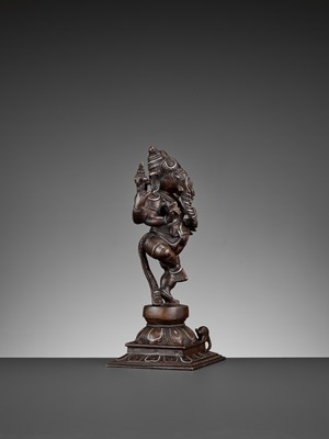 Lot 608 - A SILVER-INLAID BRONZE FIGURE OF GANESHA DANCING, 18TH-19TH CENTURY