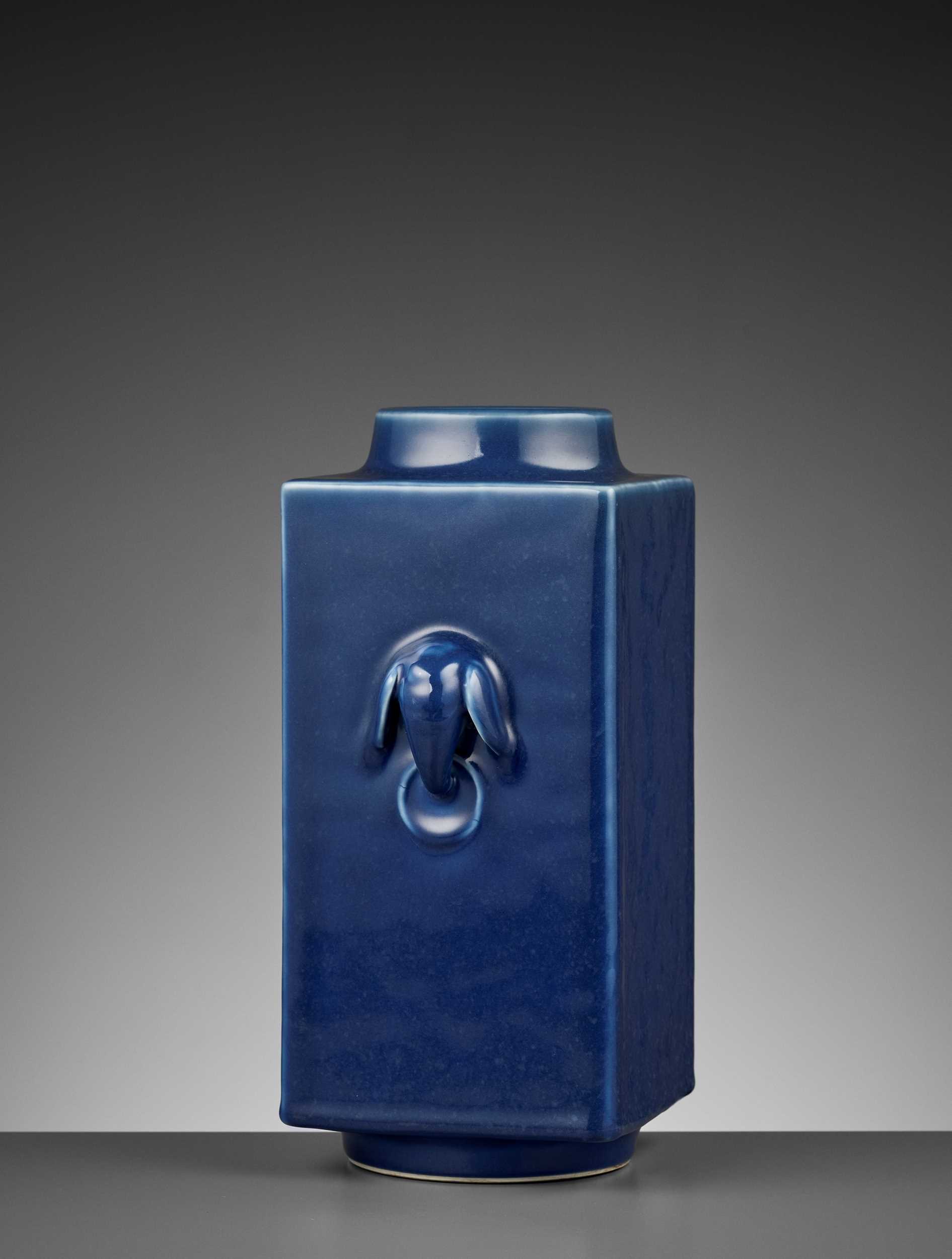 Lot 272 - A BLUE-GLAZED CONG-FORM VASE WITH ELEPHANT HANDLES, GUANGXU MARK AND PERIOD