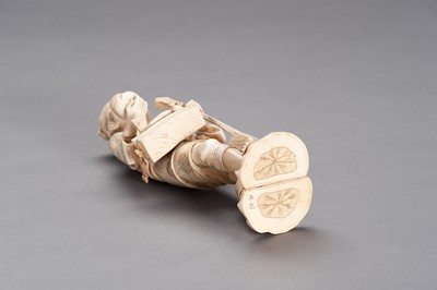 Lot 253 - AN IVORY AND BONE OKIMONO OF A TOY SELLER