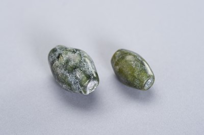 Lot 259 - TWO FINE JADE BEADS