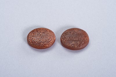 Lot 677 - TWO GLASS PRAYERS BEADS WITH ISLAMIC INSCRIPTIONS