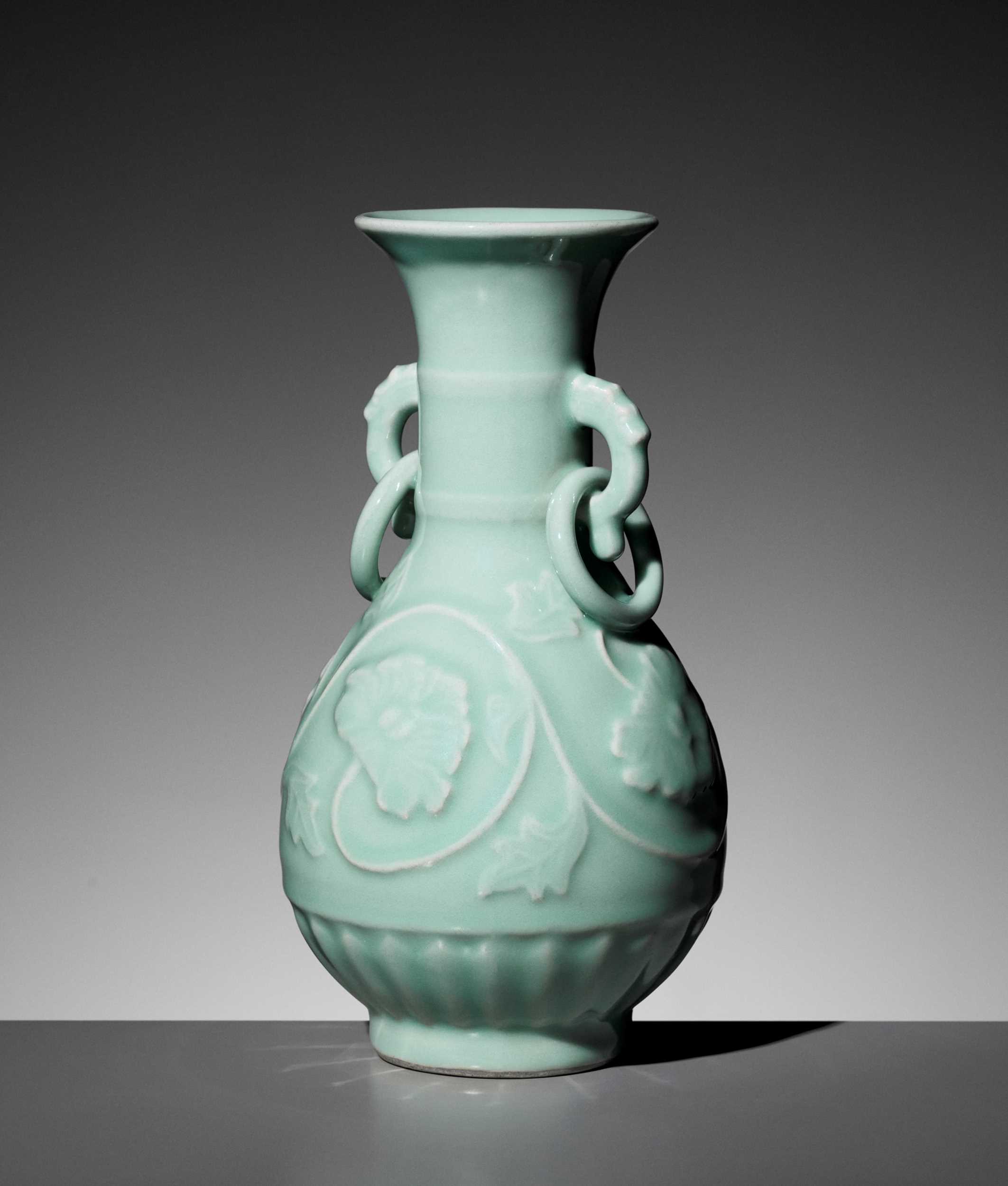 Lot 667 - A LONGQUAN CELADON RING-HANDLED VASE, YUHUCHUNPING, 1900s