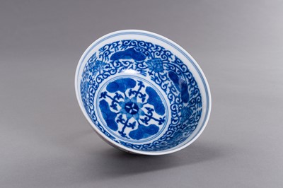 Lot 430 - A FAMILLE VERTE ENAMELED PORCELAIN ‘LOTUS AND PEONY’ BOWL