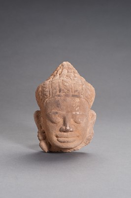 Lot 1297 - A KHMER SANDSTONE HEAD OF BUDDHA
