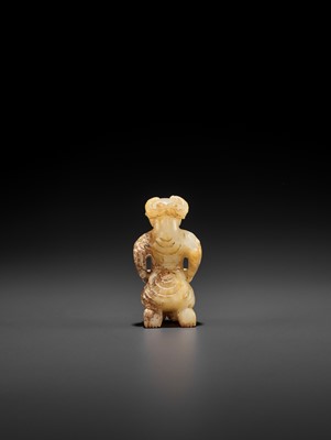 Lot 133 - A YELLOW AND RUSSET JADE FIGURE WITH A RAM’S HEAD