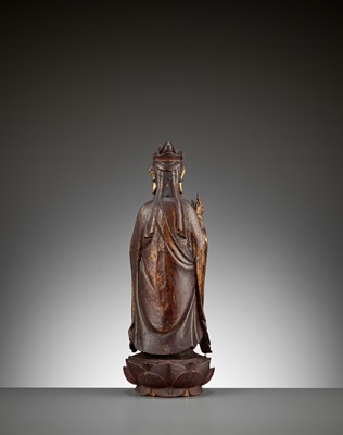 Lot 583 - A RED AND GILT-LACQUERED WOOD FIGURE OF GUANYIN, 17TH - 18TH CENTURY