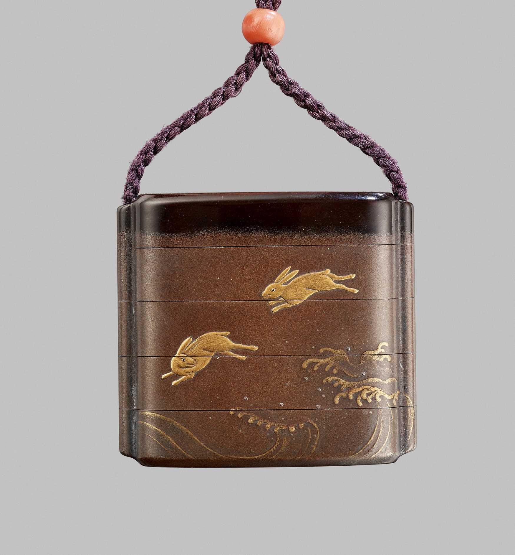 Lot 326 - A RARE GILT-INLAID LACQUER FOUR-CASE INRO WITH LUNAR HARES, MOON, AND BENTEN