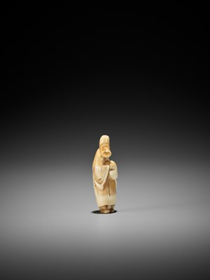 Lot 281 - A RARE BOAR’S TOOTH NETSUKE OF A DRUNK COURT SERVANT WITH SAKE JAR