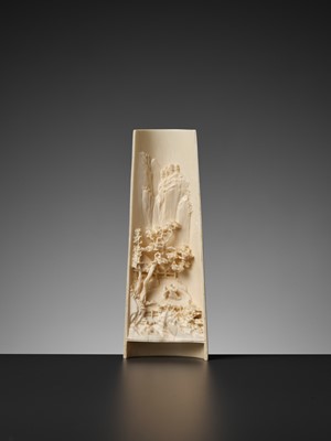 Lot 478 - AN IVORY ‘MOUNTAIN LANDSCAPE’ WRIST REST, LATE QING TO REPUBLIC