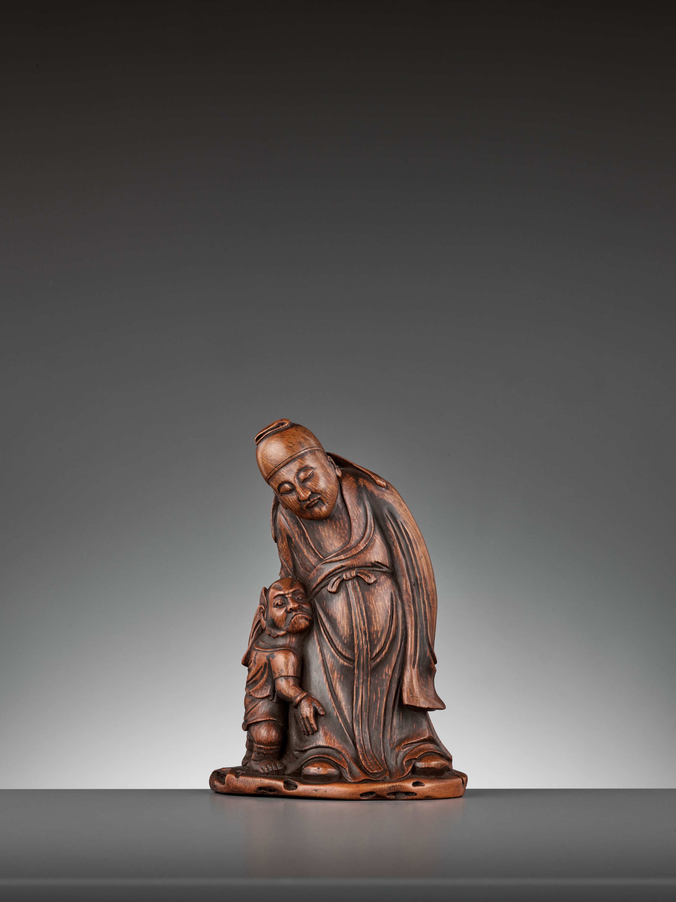 A CARVED BAMBOO FIGURE OF ZHONG KUI, MID-QING 清代中期 