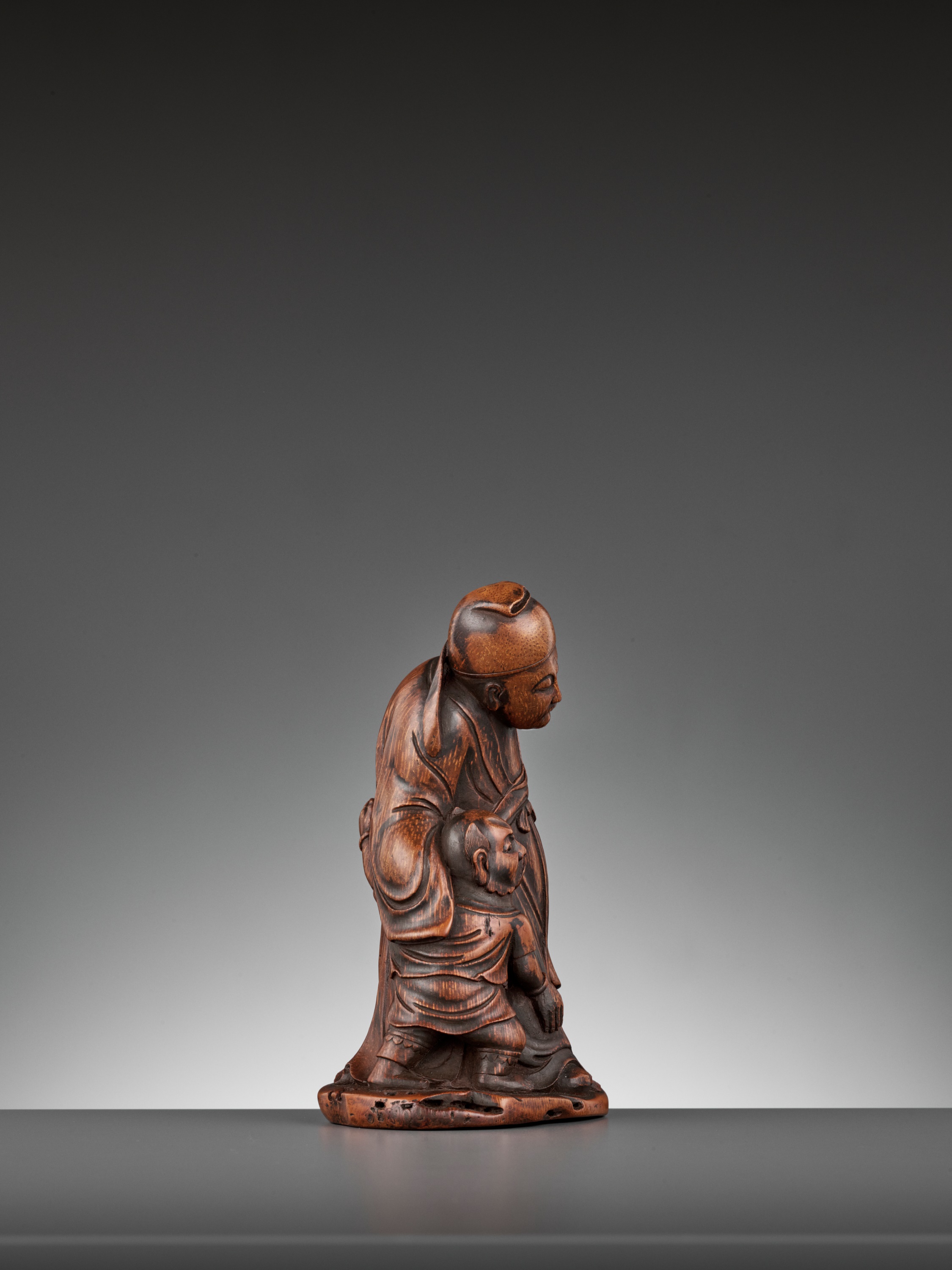 Lot 440 - A CARVED BAMBOO FIGURE OF ZHONG KUI,