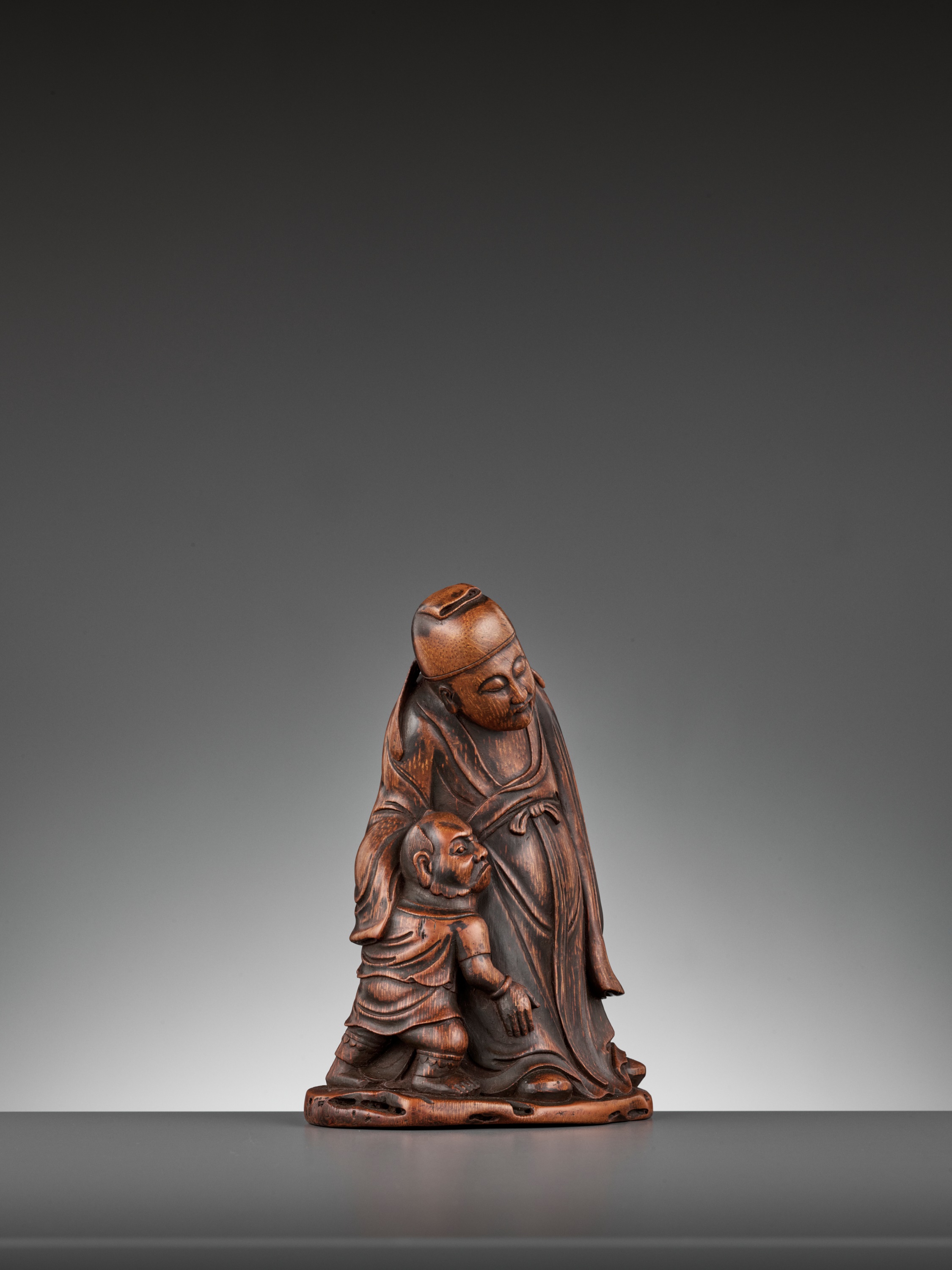 Lot 440 - A CARVED BAMBOO FIGURE OF ZHONG KUI,