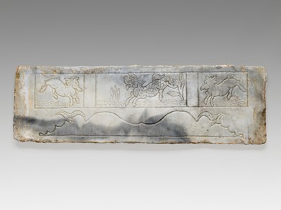 Lot 12 - TWO ‘MYTHICAL BEAST’ MARBLE PANELS, FRAGMENTS OF A FUNERARY STRUCTURE, TANG TO JIN DYNASTY