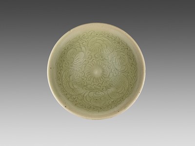 Lot 166 - A YAOZHOU MOLDED ‘CHRYSANTHEMUM’ BOWL, NORTHERN SONG DYNASTY
