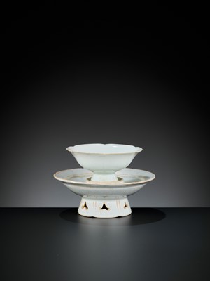 Lot 159 - A QINGBAI FLORAL-LOBED CUP AND STAND, SONG