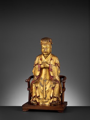 Lot 399 - A LARGE GILT-LACQUERED WOOD FIGURE OF WENCHANG WANG, MING DYNASTY