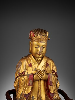 Lot 399 - A LARGE GILT-LACQUERED WOOD FIGURE OF WENCHANG WANG, MING DYNASTY