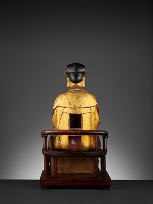 Lot 399 - A LARGE GILT-LACQUERED WOOD FIGURE OF WENCHANG WANG, MING DYNASTY