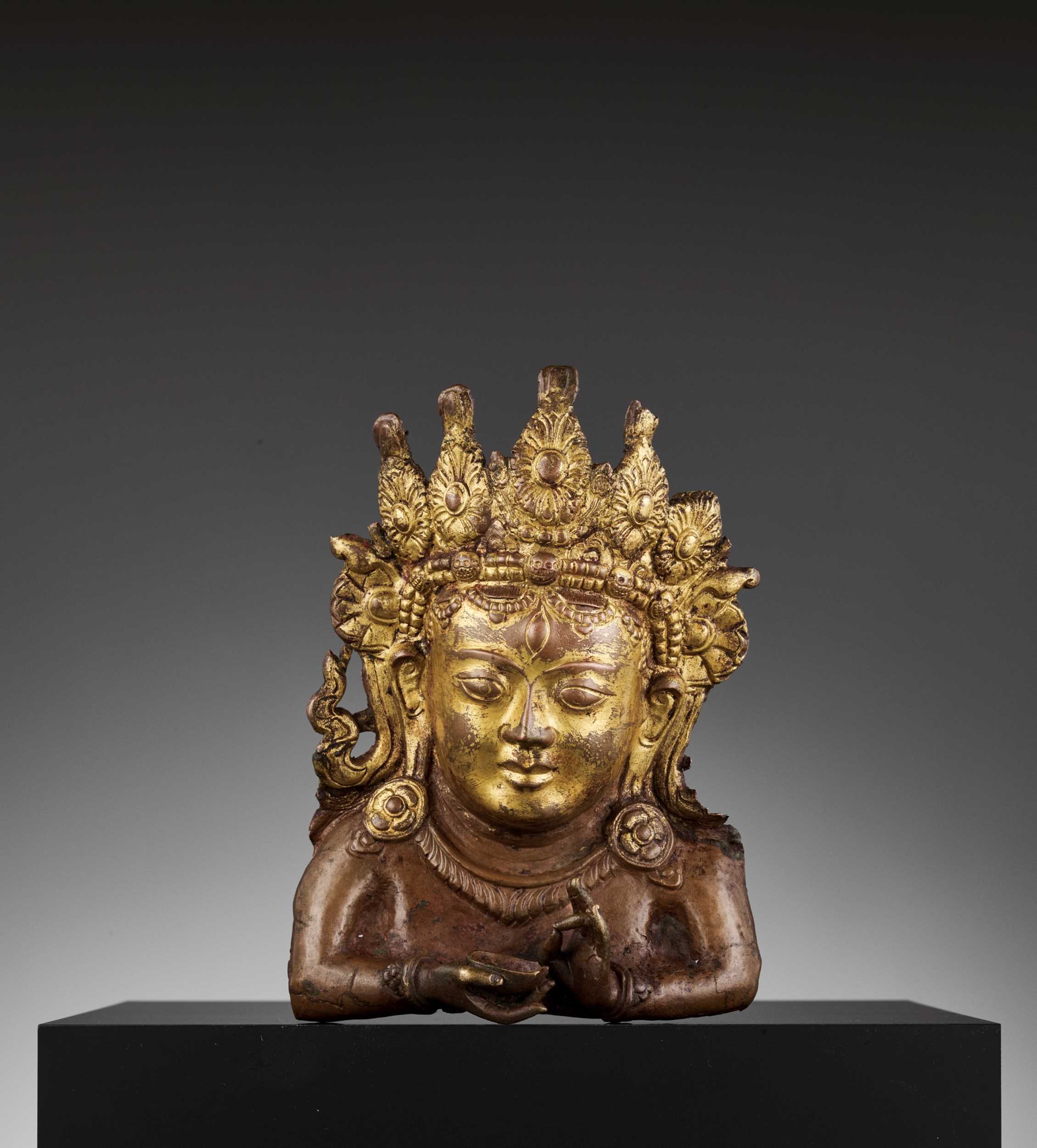 Lot 435 - A GILT COPPER REPOUSSÉ RELIEF DEPICTING A