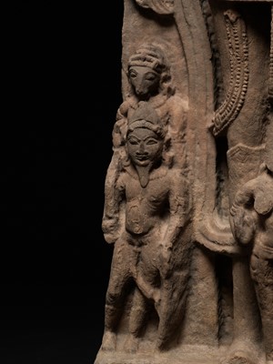 A MONUMENTAL SANDSTONE STELE OF SURYA, NORTHERN INDIA, UTTAR PRADESH, 11TH-12TH CENTURY